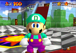 Picture of Mario with a letter D on his cap, aqua blue shirt, cap, and purple overalls.